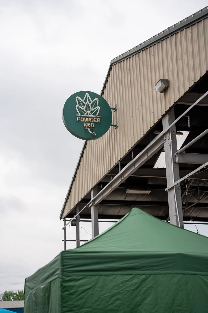 The Powder Keg sign and roofline above the market.