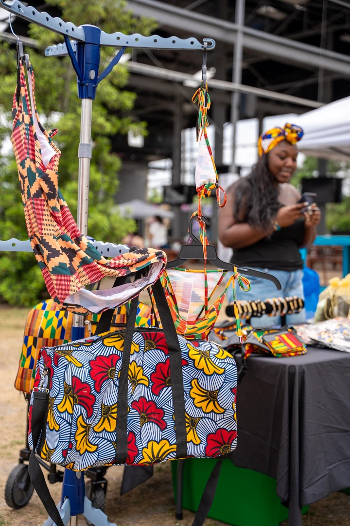 Woven bags with vivid red, yellow and green patterns.