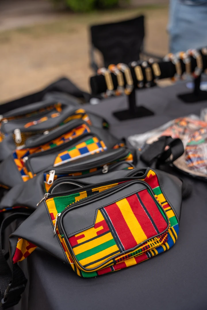 Woven bags with vivid red, yellow and green patterns.