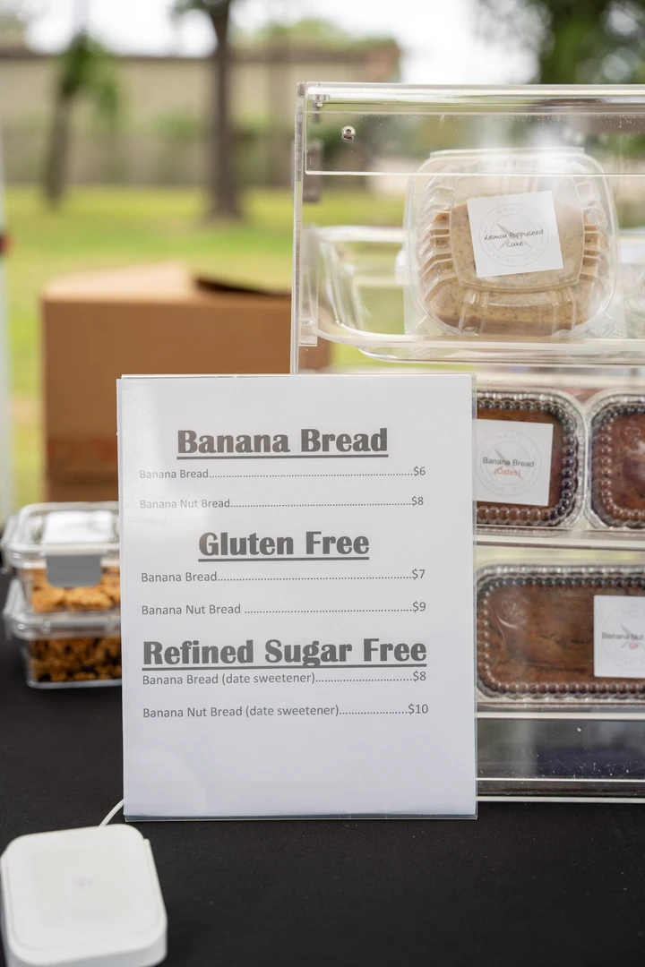 Packaged baked goods and their printed menu cards.