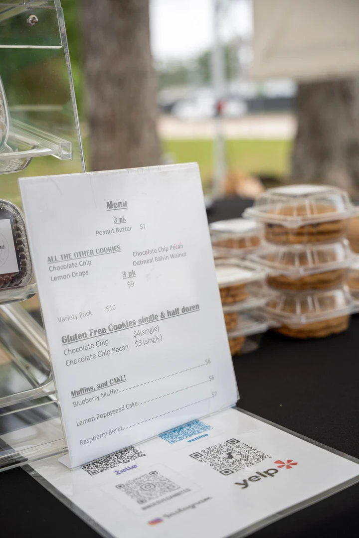Packaged baked goods and their printed menu cards.