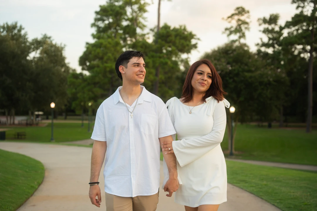 Mag and Michelle stand together on a curving park path.
