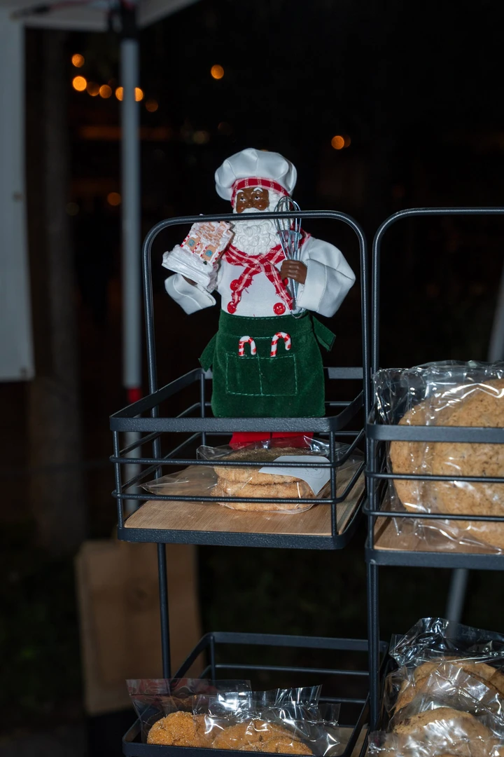 Packaged baked goods on a shelf with festive decorations.