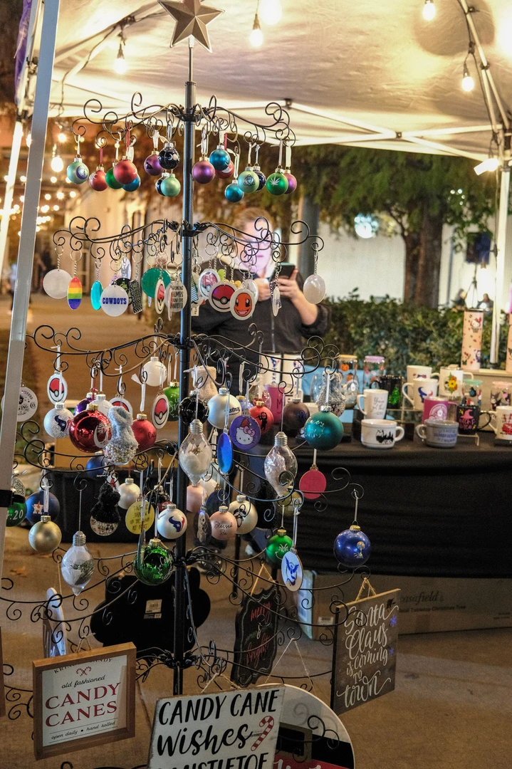 Handmade accessories and small gifts at illuminated outdoor stalls.