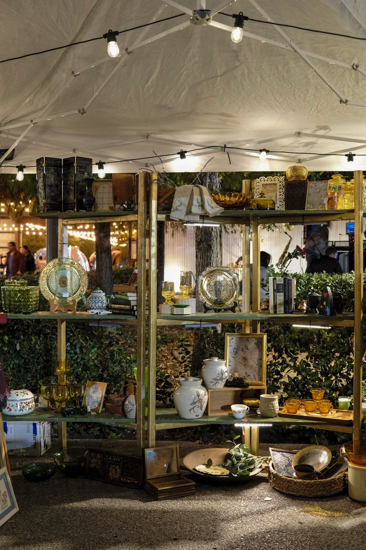 Handmade accessories and small gifts at illuminated outdoor stalls.