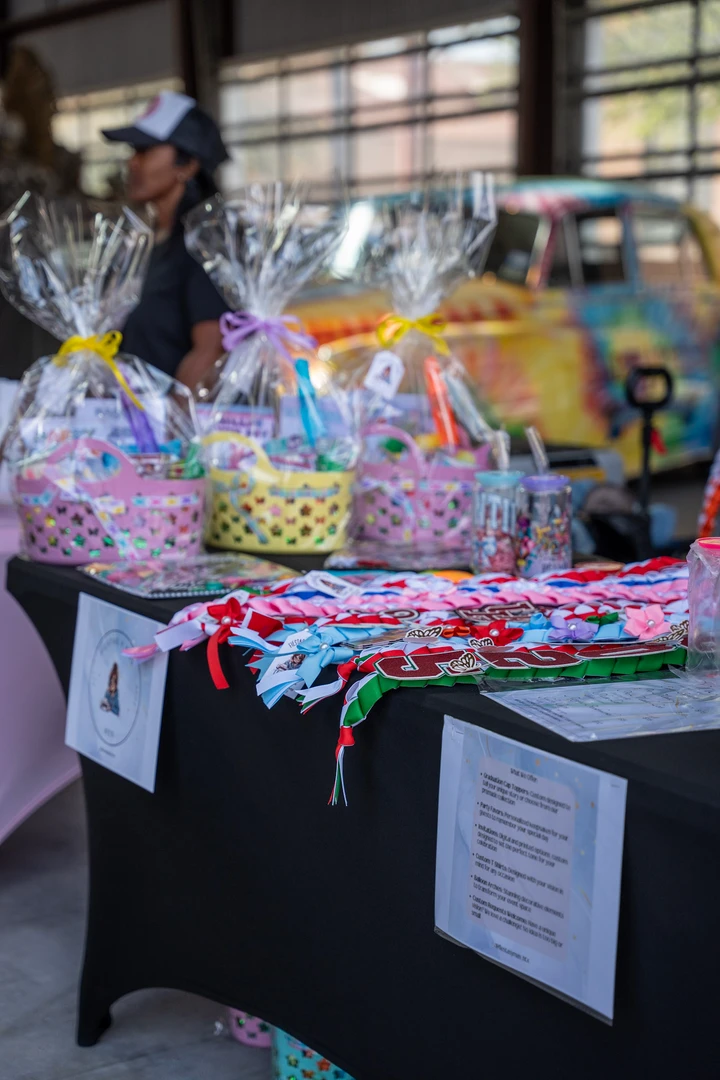 Bright gift baskets and accessories on a market table.