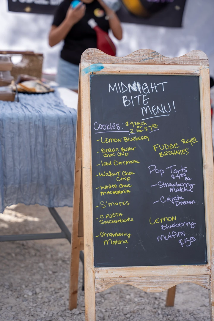 A handwritten market menu on a chalkboard.